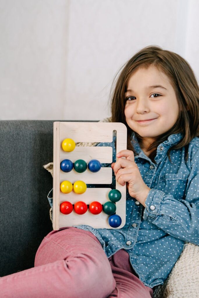 Young Girl Holding a Wooden Board Game